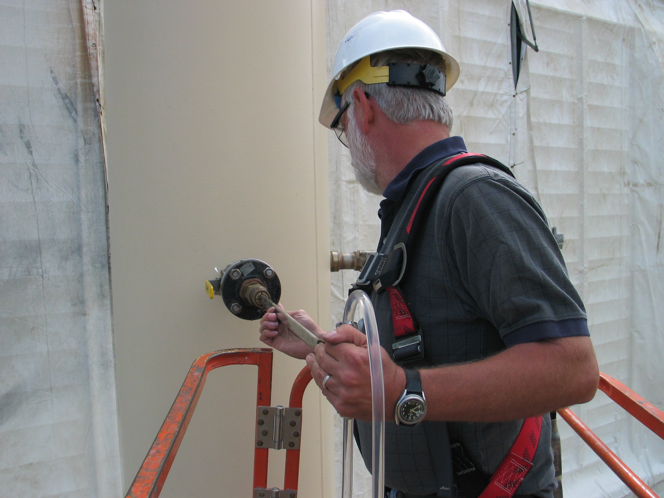 CleanAir employee measuring flow rate